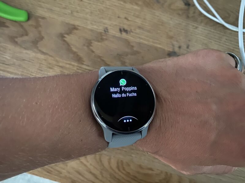 Hybrid smartwatch sensors at the back of the dial.
